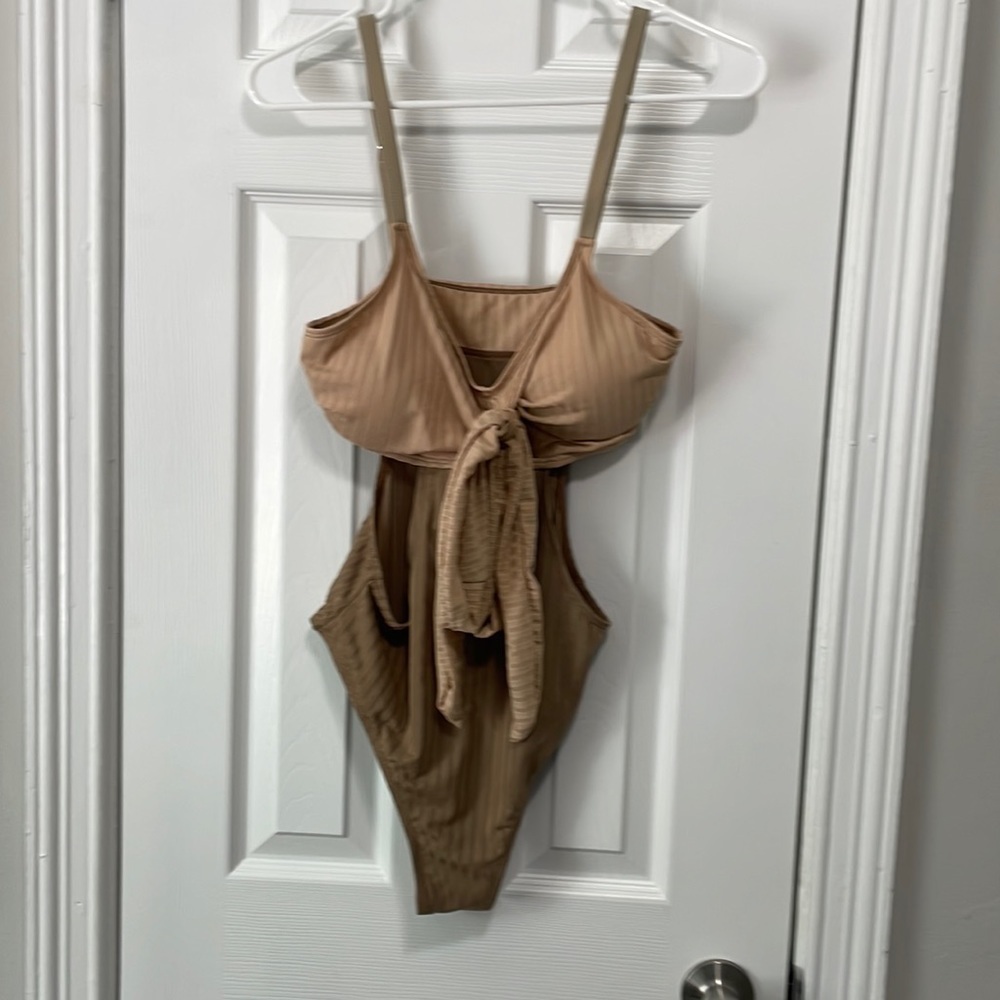 NWOT cut out one piece suit